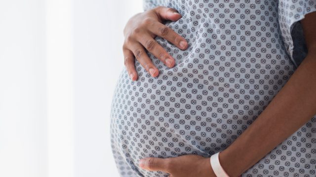 Black woman pregnant in hospital