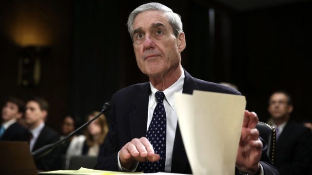 WASHINGTON, DC - JUNE 19: Federal Bureau of Investigation (FBI) Director Robert Mueller waits for the beginning of a hearing before the Senate Judiciary Committee June 19, 2013 on Capitol Hill in Washington, DC. Mueller confirmed that the FBI uses drones for domestic surveillance during the hearing on FBI oversight. (Photo by Alex Wong/Getty Images)