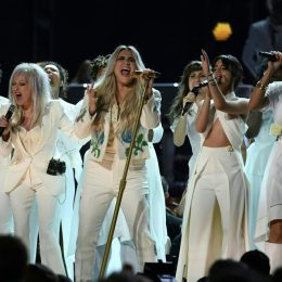 Kesha (C) performs with (from L to R) Bebe Rexha, Cindy Lauper, Camila Cabello and Andra Day during the 60th Annual Grammy Awards show on January 28, 2018, in New York. / AFP PHOTO / Timothy A. CLARY