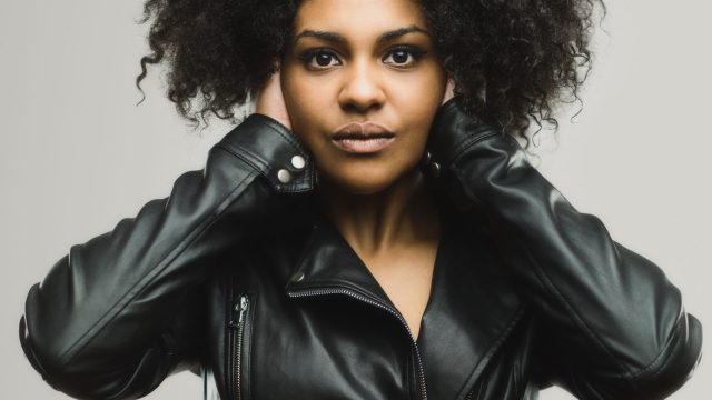 woman cover ears