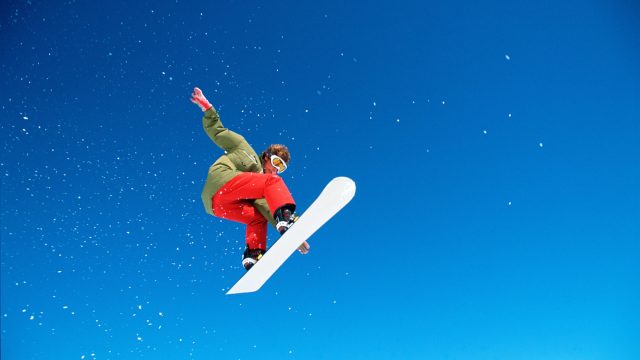 Photo of Athlete in Big Air Snowboarding Competition
