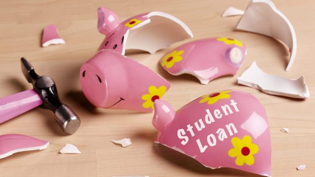 Photo of Broken Piggy Bank Representing Student Loan Debt