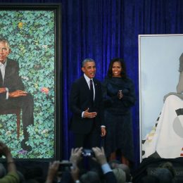 WASHINGTON, DC - FEBRUARY 12: Former U.S. President Barack Obama and former first lady Michelle Obama stand next to their newly unveiled portraits during a ceremony at the Smithsonian's National Portrait Gallery, on February 12, 2018 in Washington, DC. The portraits were commissioned by the Gallery, for Kehinde Wiley to create President Obama's portrait, and Amy Sherald that of Michelle Obama.