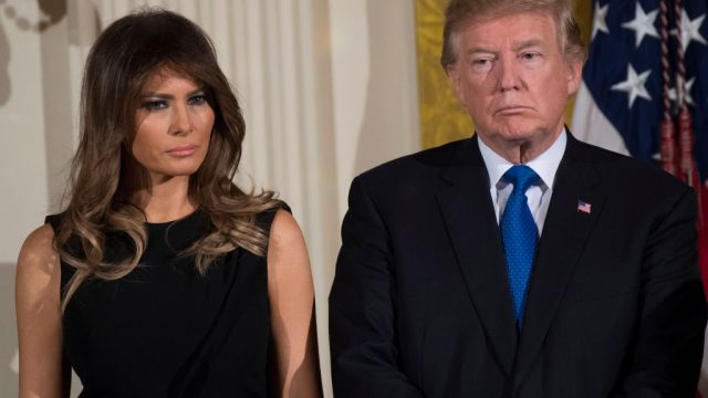 TOPSHOT - US President Donald Trump and First Lady Melania Trump attend a Hanukkah reception in the East Room of the White House in Washington, DC, December 7, 2017. / AFP PHOTO / SAUL LOEB (Photo credit should read SAUL LOEB/AFP/Getty Images)