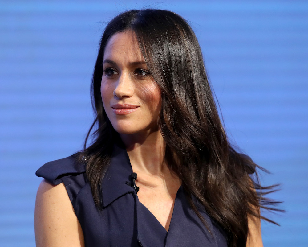Meghan Markle wore designer Jason Wu's navy trench dress during a royal ...