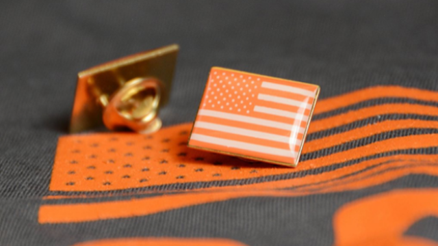 Orange pin with American flag from Everytown