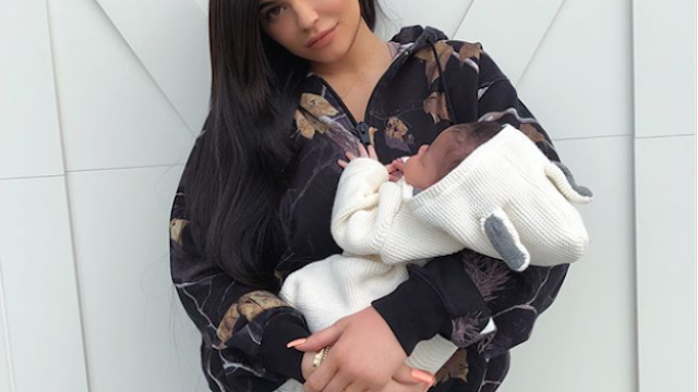 Kylie Jenner holding Stormi