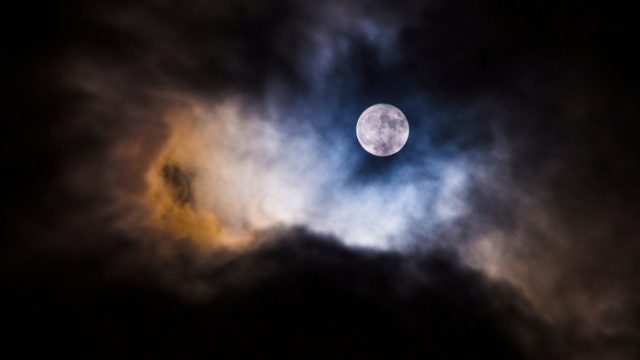 Low Angle View Of Moon In Sky