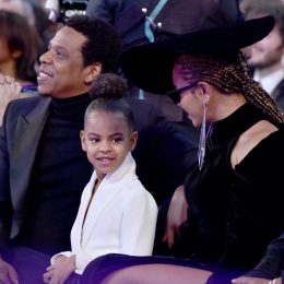 Photo of Blue Ivy, Beyoncé, and Jay-Z at the 60th Annual Grammy Awards