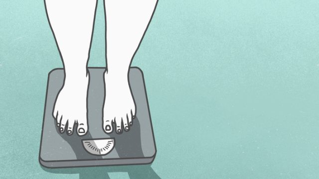 Illustration of woman standing on scale