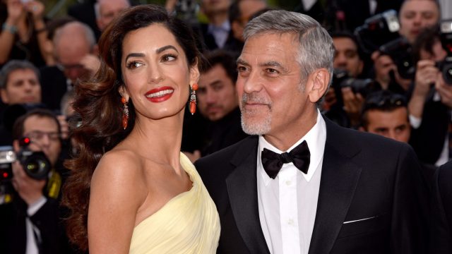 Photo of March For Our Lives Attendees George and Amal Clooney
