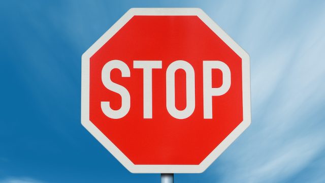 Stop - Traffic Sign with deep blue Sky