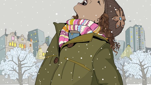 Little girl catching snowflakes in her mouth