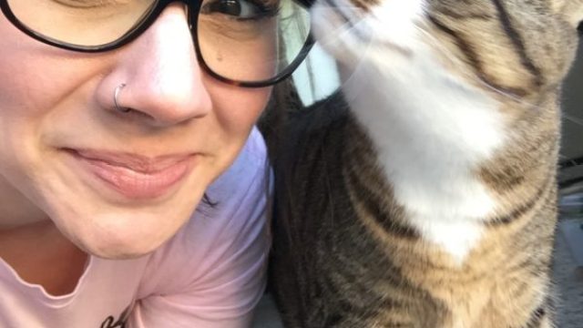 Woman with tabby cat
