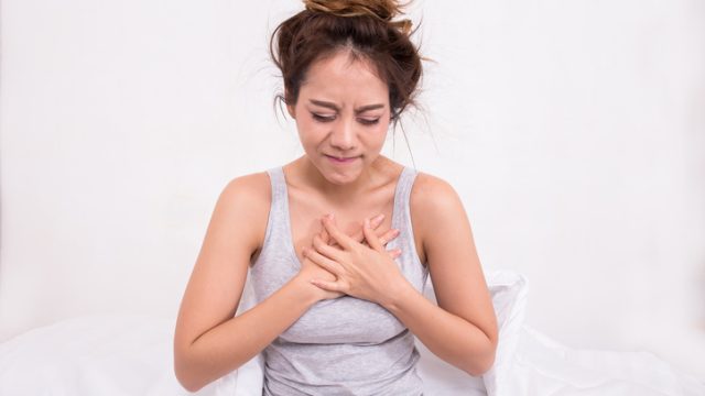 woman with chest pains