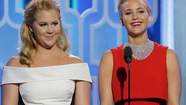 BEVERLY HILLS, CA - JANUARY 10: In this handout photo provided by NBCUniversal, Presenters Amy Schumer and Jennifer Lawrence speak onstage during the 73rd Annual Golden Globe Awards at The Beverly Hilton Hotel on January 10, 2016 in Beverly Hills, California.