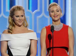 BEVERLY HILLS, CA - JANUARY 10: In this handout photo provided by NBCUniversal, Presenters Amy Schumer and Jennifer Lawrence speak onstage during the 73rd Annual Golden Globe Awards at The Beverly Hilton Hotel on January 10, 2016 in Beverly Hills, California.