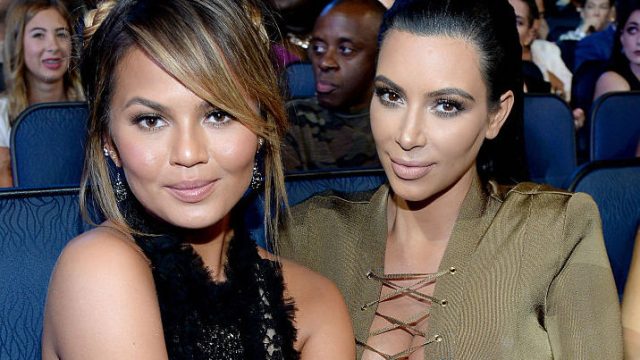 LOS ANGELES, CA - AUGUST 30: Chrissy Teigen and Kim Kardashian West attend the 2015 MTV Video Music Awards at Microsoft Theater on August 30, 2015 in Los Angeles, California. (Photo by