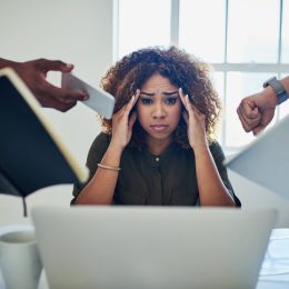 Woman stressed at her job