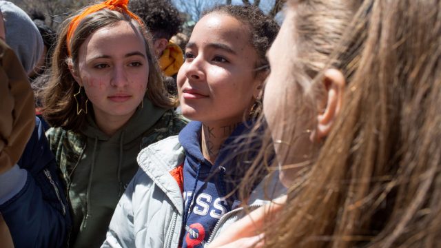 NEW YORK, NY - APRIL 20: On the anniversary of the Columbine shooting, thousands of New York teenagers walk out of school to attend a gun control rally and call for sweeping reforms in national gun laws, on April 20, 2018 in Washington Square Park in New York City. (Photo by Andrew Lichtenstein/Corbis via Getty Images)
