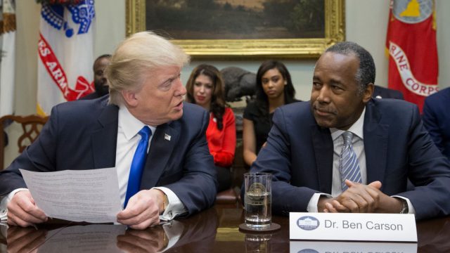 WASHINGTON, DC - FEBRUARY 1: (AFP OUT) President Donald Trump (L), holds an African American History Month listening session attended by nominee to lead the Department of Housing and Urban Development (HUD) Ben Carson (R) and other officials in the Roosevelt Room of the White House on February 1, 2017 in Washington, DC. (Photo by Michael Reynolds - Pool/Getty Images)