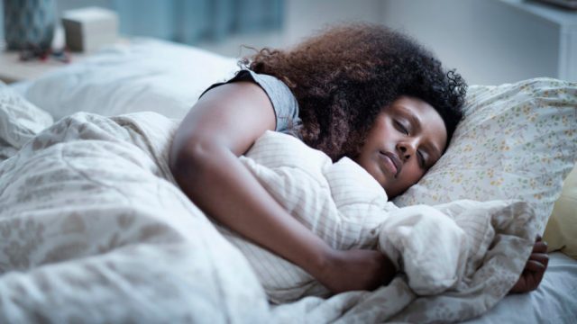 woman sleeping in bed
