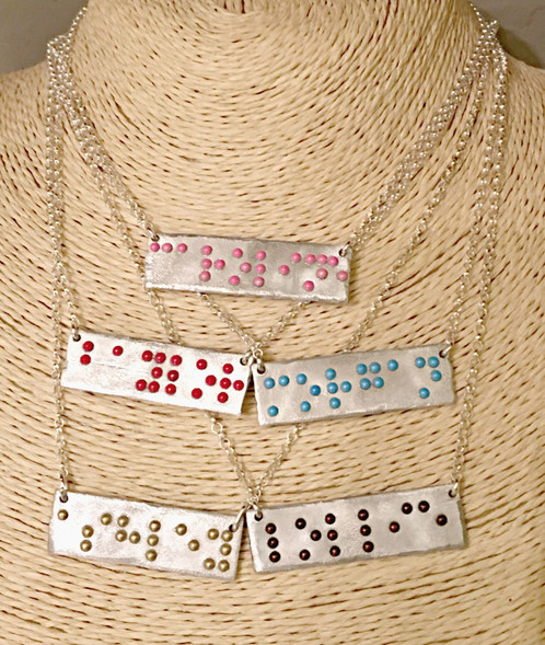 Patti-Ricky-braille-necklace.jpg