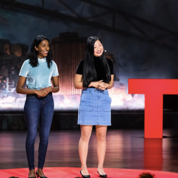 Priya Vulchi and Winona Guo presenting a TEDTalk