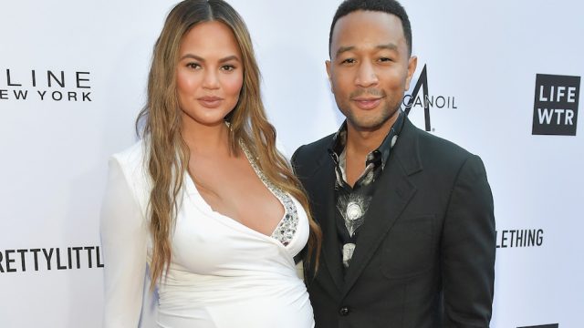 Chrissy Teigen and John Legend at The Daily Front Row fashion show