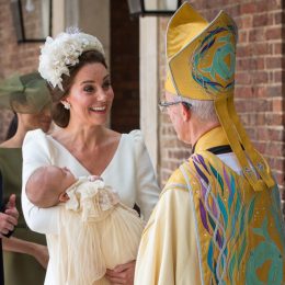 Britain's Catherine, Duchess of Cambridge holds Britain's Prince Louis of Cambridge as she speaks to Archbishop of Canterbury, Justin Welby (R) on their arrival for his christening service at the Chapel Royal, St James's Palace, London on July 9, 2018.