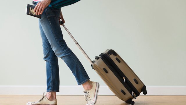 USA, New Jersey, Woman ready to go on vacations