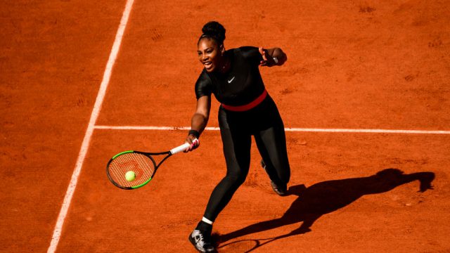 PARIS, FRANCE - MAY 29 : Serena Williams of the United States hits a forehand to Kristyna Pliskova of the Czech Republic in the first round of the women's singles during the French Open at Roland Garros on May 28, 2018 in Paris, France.