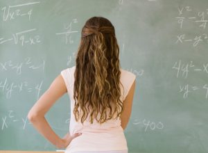 Student looking at board in classroom