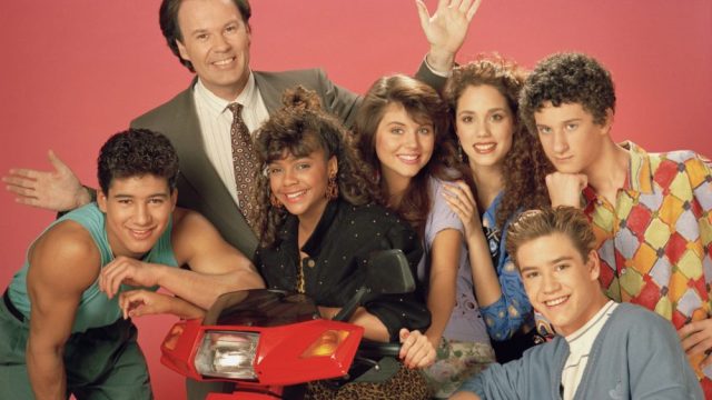 SAVED BY THE BELL -- Season 2 -- Pictured: (l-r) Mario Lopez as Alabert Clifford 'A.C.' Slater, Dennis Haskins as Mr. Richard Belding, Lark Voorhies as Lisa Turtle, Tiffani Thiessen as Kelly Kapowski, Elizabeth Berkley as Jessie Spano, Mark-Paul Gosselaar as Zachary 'Zach' Morris, Dustin Diamond as Screech Powers -