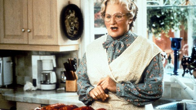 Robin Williams in the kitchen in a scene from the film 'Mrs. Doubtfire', 1993.