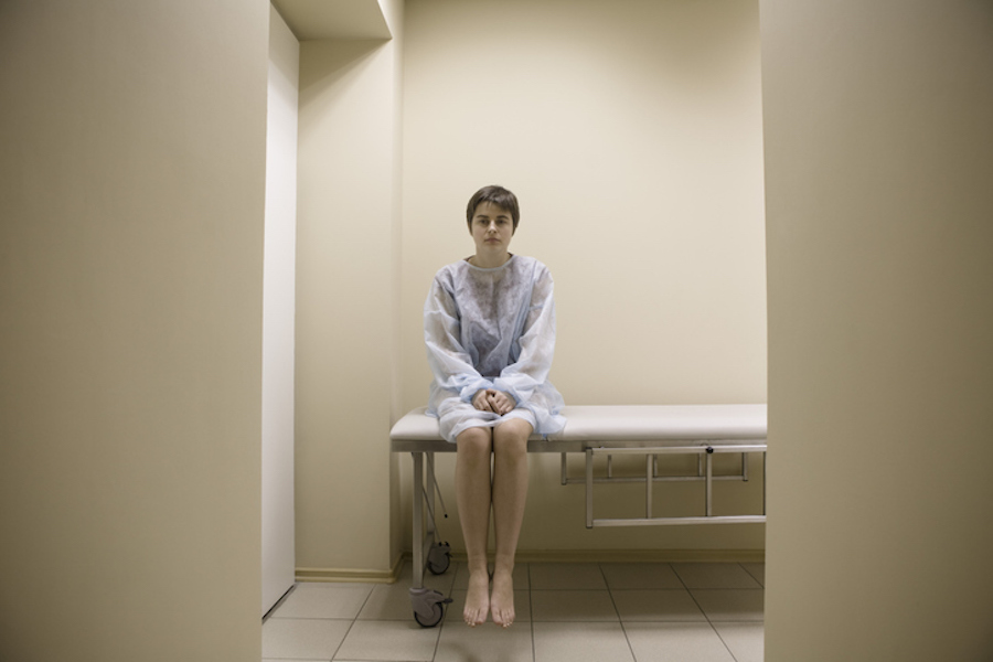 Woman on a hospital bed