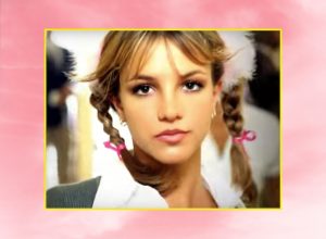 Britney Spears "...Baby One More Time" video over pink background