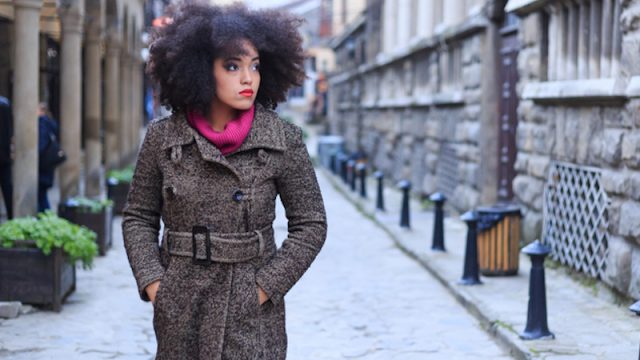 Woman walking down the street alone