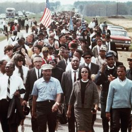 Martin Luther King and his wife Corette King lead a five-day march to the Alabama State Capitol
