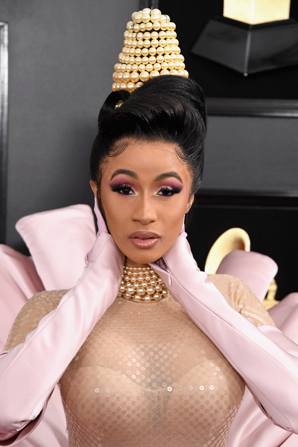 Everything You Wanted to Know About Cardi B's Pearl Beehive Hairstyle -  Brit + Co