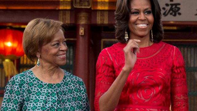 BEIJING, CHINA - MARCH 21: U.S. first lady Michelle Obama and her mother Marian Robinson (L) share a light moment with Chinese President Xi Jinping (2ndR) and his wife Peng Liyuan (R) after a photograph session at the Diaoyutai State guest house on March 21, 2014 in Beijing, China. Michelle Obama's one-week-long visit in China will be focused on educational and cultural exchanges.