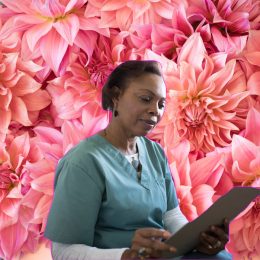 A woman doctor on a floral background