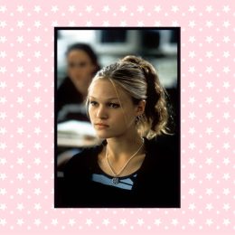 Kat Stratford from 10 Things I Hate About You on a pink starred background