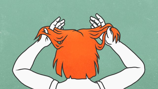 Stressed woman with her hands in her hair