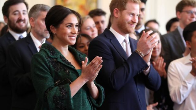 Meghan, Duchess of Sussex and Prince Harry, Duke of Sussex watch a musical performance as they attend a Commonwealth Day Youth Event at Canada House