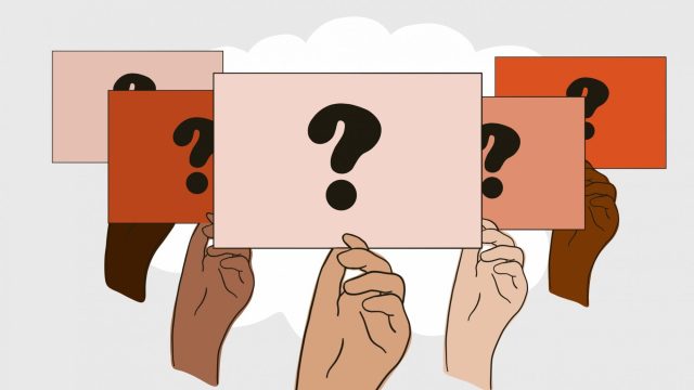 hands holding question marks