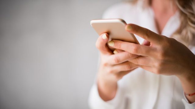 Woman using a smartphone.