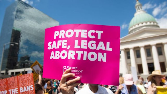 Sign at Planned Parenthood rally reading, "Protect Safe, Legal Abortion"