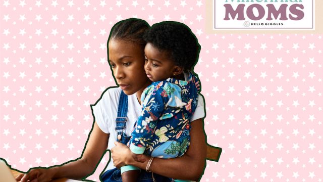 Mom working on a laptop with her son in her lap