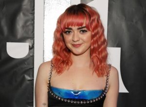 Maisie Williams with pink hair.